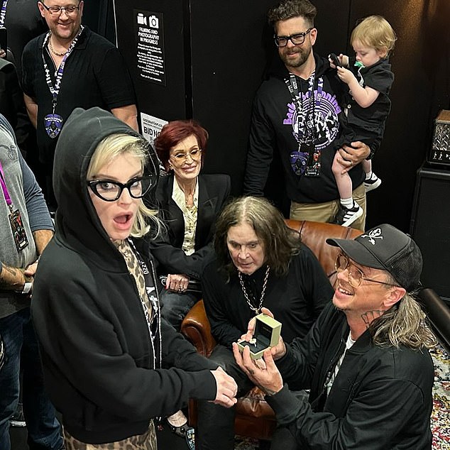 Kelly's engagement pictured at Ozzy's final show this year. She visited him in the weeks before he died