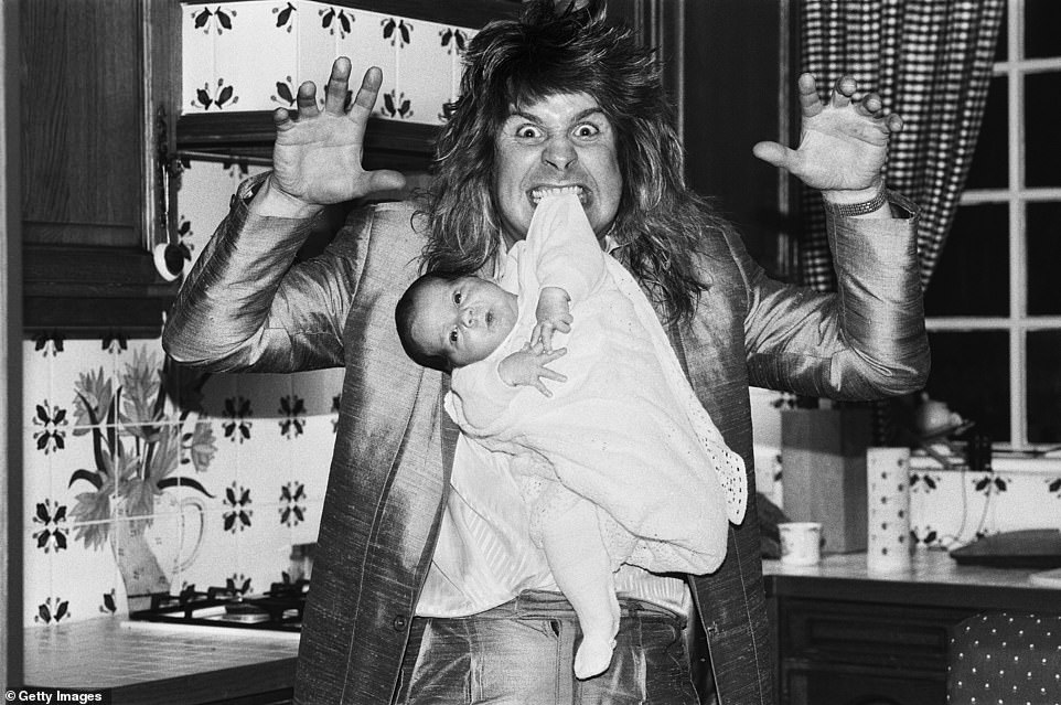 Osbourne is pictured with his then newborn son Jack in 1985, six years after he had been thrown out of Black Sabbath due to his antics