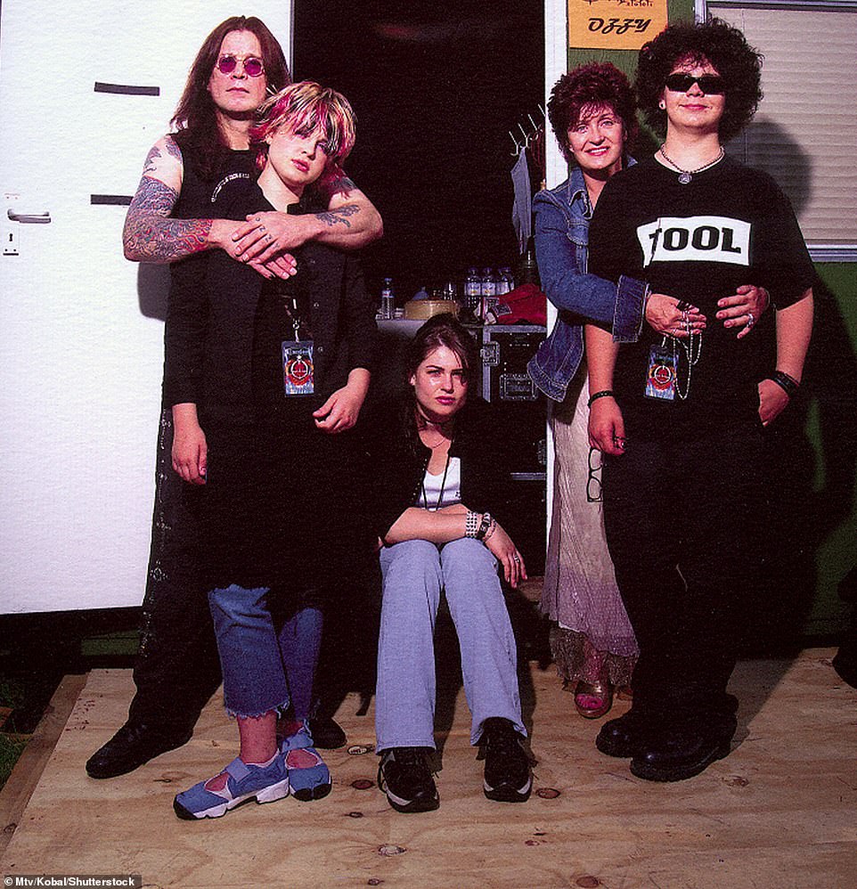Osbourne with daughters Kelly and Aimee, wife Sharon and son Jack in 2002 - the year that the family's show The Osbournes began