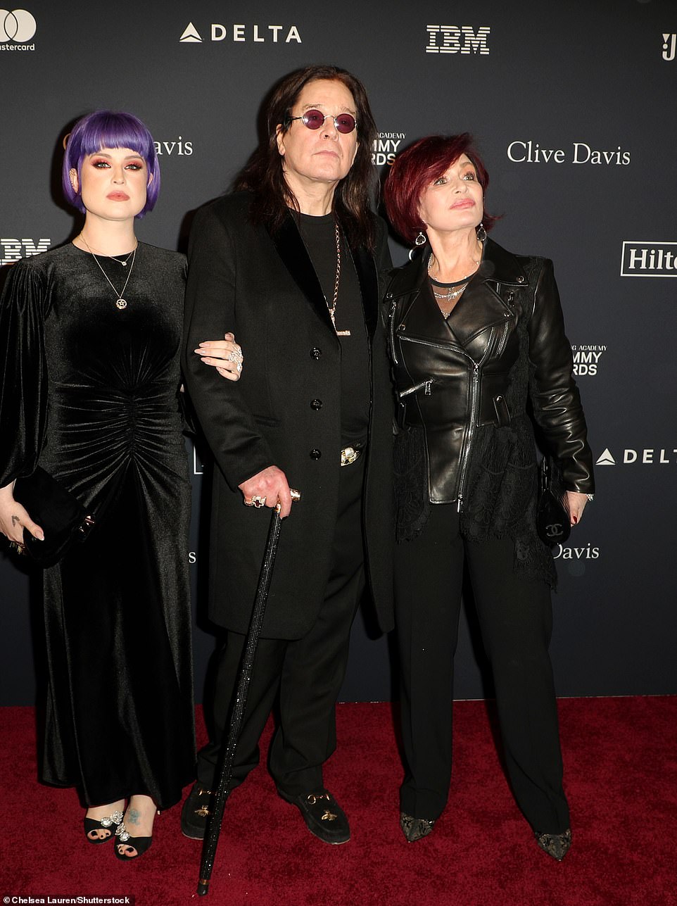 Osbourne and Sharon turned themselves and their children into TV stars with their documentary The Osbournes. Above: The singer with Sharon and Kelly in 2020