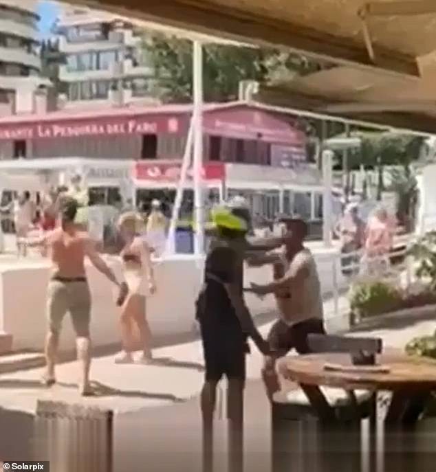 The unidentified holidaymaker appeared to yell 'hijo de puta', which translates in English to 'son of a b****', before being hit
