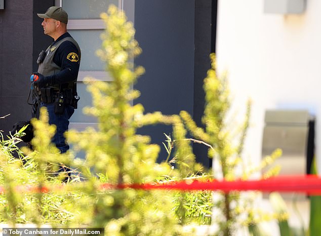 Authorities spotted blood at the front entrance before breaking through a window, where they found the couple both shot in the head in different rooms