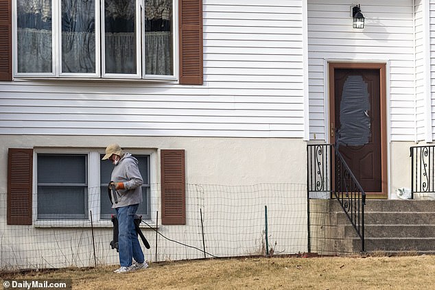 On December 30, 2022, Kohberger was arrested at his parents' home. Pictured: Michael Kohberger cleans up the property after the raid