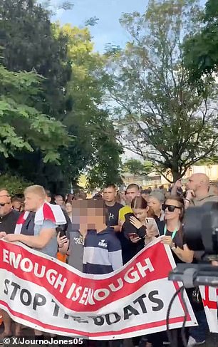 Protesters held up banners saying 'stop the boats'
