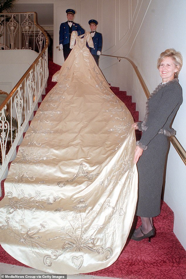 But it was not until she designed Fergie¿s £35,000 ivory duchess satin gown, with its 17½ft-long train with an S and an A in silver beads, that her place was cemented in fashion history