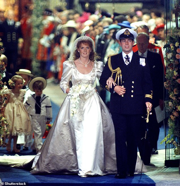Five full-time beaders then embroidered the bride¿s own coat of arms on the garment with thistles and bees interwoven with the couple¿s heraldic initials and naval anchors with waves and hearts