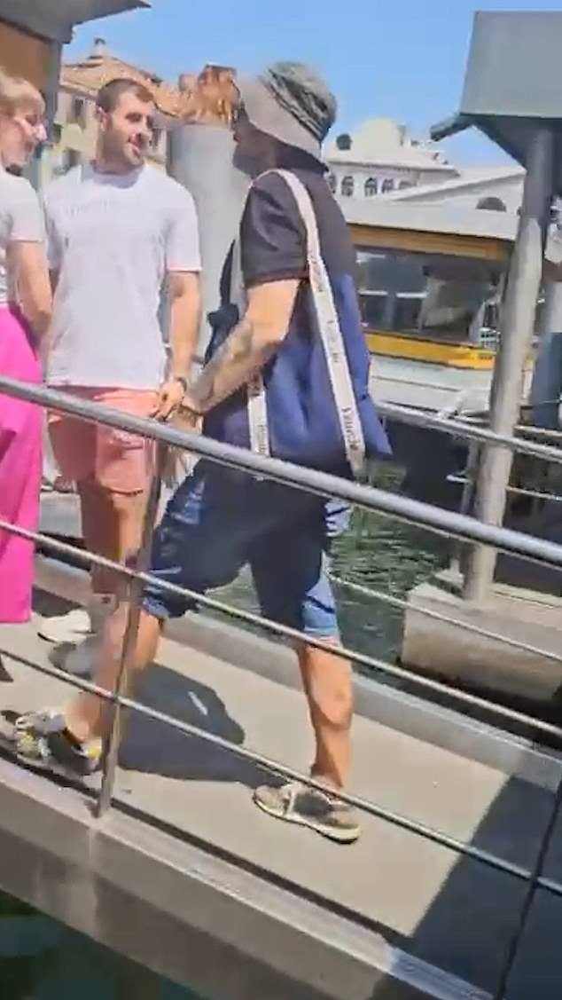Another man is also seen leaving the jetty after being spotted