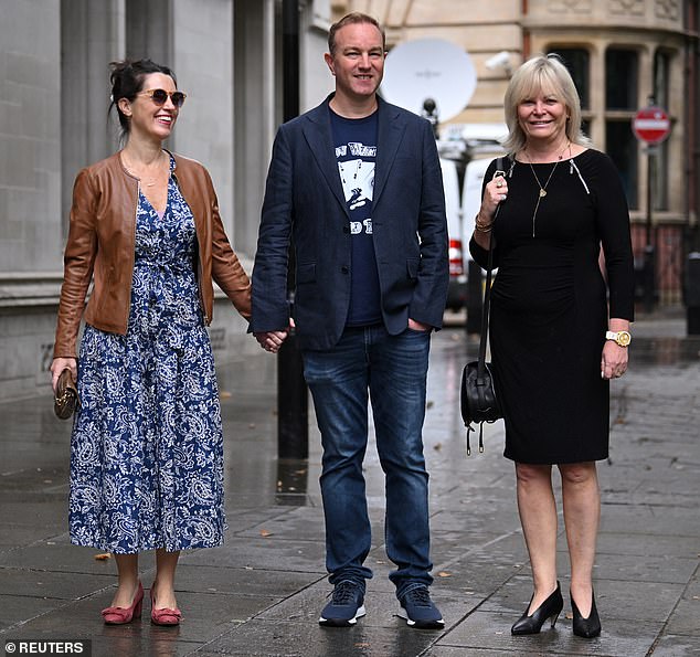 Tom Hayes (centre), a former Citigroup and UBS trader, outside London's Supreme Court today