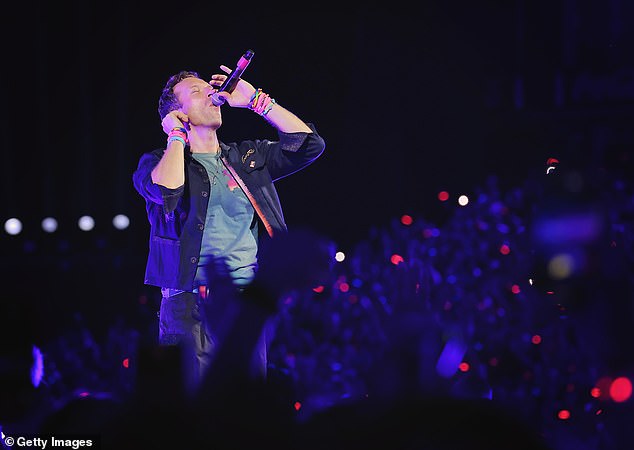 Elsewhere Chris Martin also dedicated Coldplay's show at Nissan Stadium, Nashville, on Tuesday to Ozzy (Pictured)