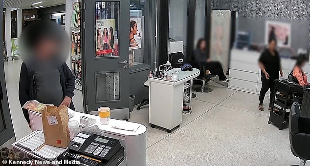 He can be seen swiping his newspaper and the hairdresser's costly mobile off the counter and making a swift getaway before anyone had noticed the device was gone