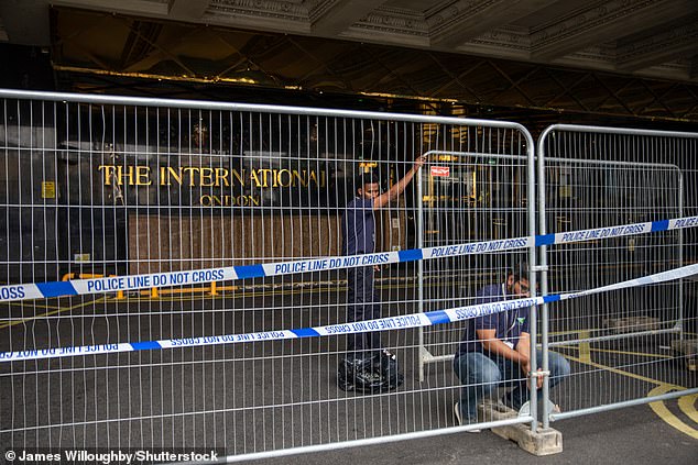 A police cordon and fencing is placed outside the Britannia International Hotel this morning