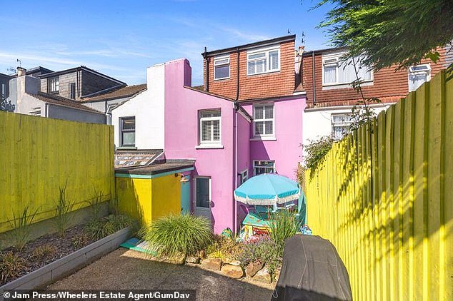 The same vibrant colours are seen on the back of the property in the south coast