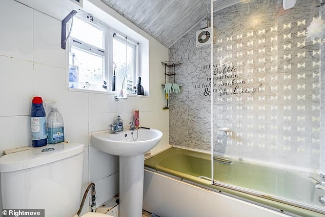 Inside the grey bathroom, the home-owner also has a strange quote plastered on the wall
