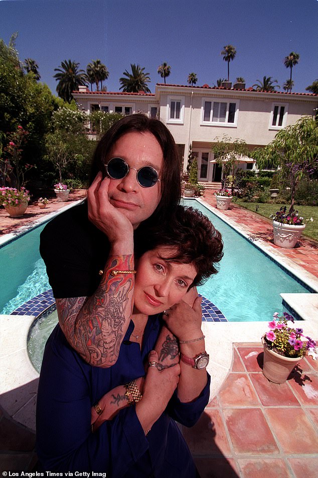 He and Sharon had intended to leave their Beverly Hills mansion behind more than two years ago (pictured poolside in around 2006)