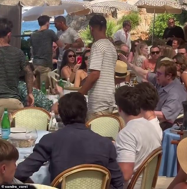 Footage of Elton and Brooklyn, which has been shared on social media, showed the pair shaking hands, with sources claiming he 'said his peace' on the family row