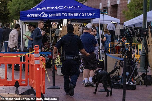 At 6.A.M. Idaho State Police with dogs do a sweep of trash cans, news media equipment and the cloud outside the Ada County Courthouse ahead of the July, 23rd, 2025 sentencing of killer Bryan Kohberger.