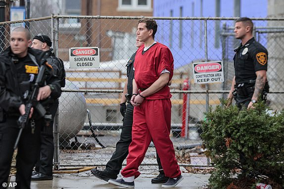 FILE - Bryan Kohberger, facing first-degree murder charges in the deaths of four University of Idaho students last fall, is taken by sheriff's deputies from the Monroe County Courthouse in Stroudsburg, Pa., Tuesday, Jan. 3, 2023. (Steven M. Falk/The Philadelphia Inquirer via AP, File)