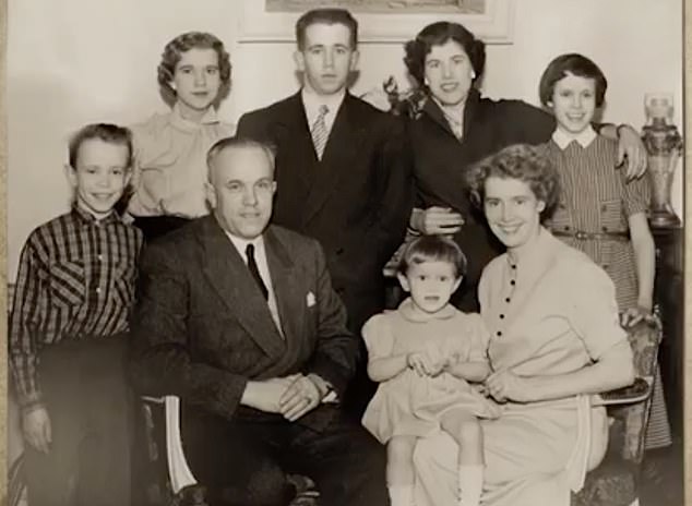 The girl with a pudding bowl haircut sitting on her mother’s knee is Brigitte Trogneux. Her family are renowned chocolatiers and confectioners in the Amiens region of northern France