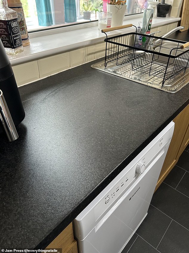 The counter top before was black, which Natalie felt contributed to the room feeling dark and gloomy