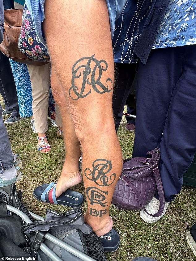 Phil Smith, 61, from Northampton pulled up his shorts to show Her Majesty his latest royal inking