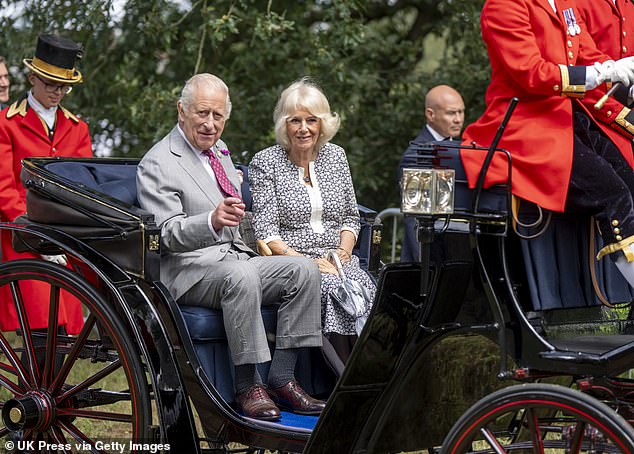 The couple then headed back to Sandringham House in their carriage, smiling and waving to onlookers