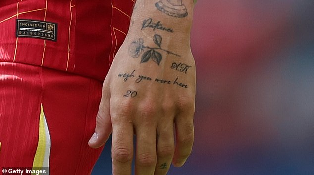 The Liverpool defender's tattoo tribute reads 'Wish you were here' and featured Jota's No 20