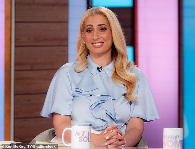 However, the TV personality, 35, has been notably absent from the hit ITV daytime show Loose Women in recent months, and fans are desperate to know why (pictured last year)