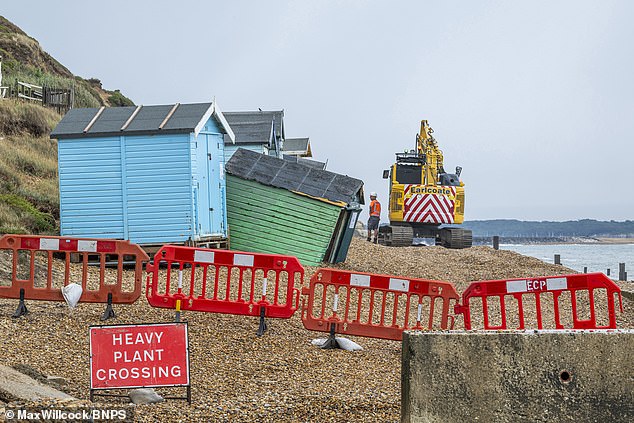 Work is underway to remove more than £1million worth of beach huts that have been condemned due to coastal erosion