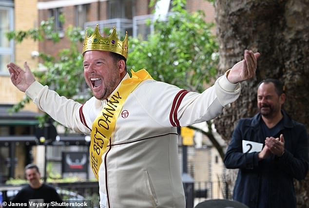 One man sporting a white Sergio Tacchini jacket was eventually crowned the country's best Danny lookalike - despite facing stiff competition