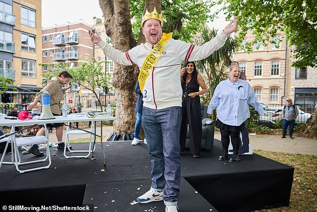 The day's winner was jubilant in celebration after being crowned the 'Best Danny', and was pictured punching the air in front of the crowds who turned up for the occasion