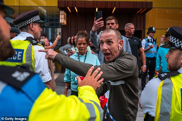 Protestors outside the Britannia International Hotel, where asylum seekers are currently being housed