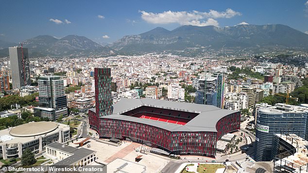 Since moving to Tirana, the seasoned solo traveller now enjoys a 'vibrant' social life, opts to 'walk everywhere' instead of driving, and pays significantly less for rent (Pictured: Air Albania (Arena Kombetare) in Capital of Tiran)
