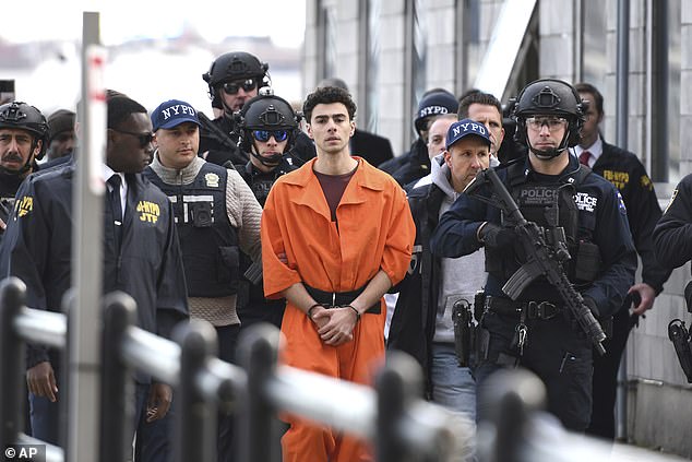 Dr Dolphin shared a photograph of Mangione in an orange jumpsuit surrounded by police