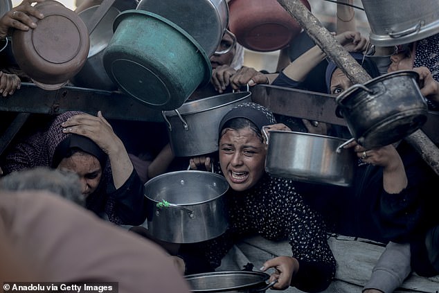 Harrowing scenes among crowds at aid points have shown desperate women and children pleading for food
