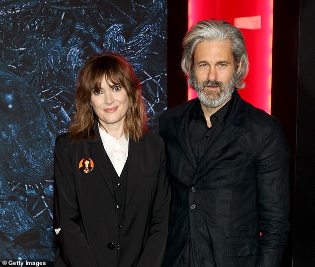 Meanwhile Winona has been in a relationship with fashion designer Scott Mackinlay Hahn since 2011 (pictured together in 2022)
