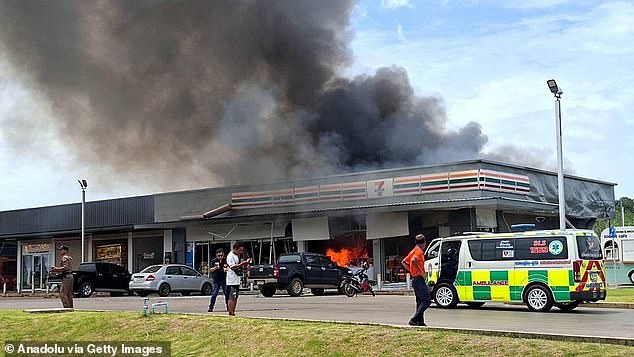 Smoke rises from PTT gas station area at Ban Phue, Nong Ya Lat sub-district as several people were killed after Cambodian artillery struck a convenience store located at a petrol station in Thailand's Sisaket border province, Thailand's public broadcaster reported on Thursday, in Sisaket, Thailand on July 24