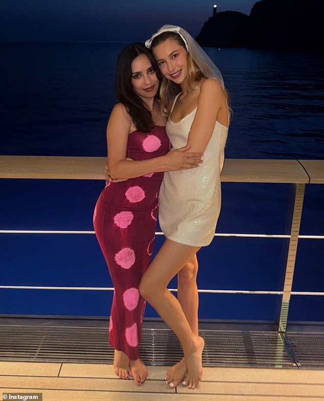 During her hen do, Eve posed for photos with a group of close friends, including one shot of her wrapped in the arms of Eden Mack, a creative development assistant at Apple TV+ (pictured)