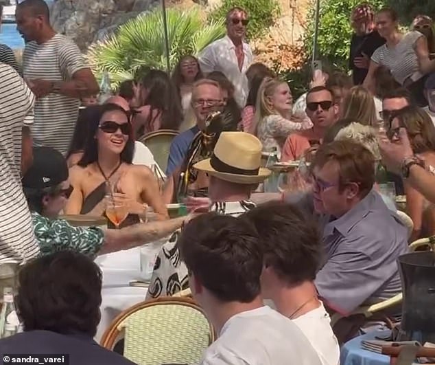 Amid their trip the couple enjoyed a swanky lunch with Brooklyn's stepdad Elton John, who sources revealed planned the dinner in a desperate attempt to calm the family's feud