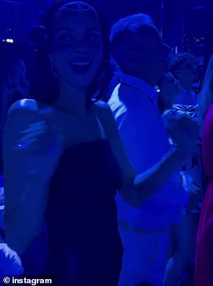 The stunner showcased her dance moves and played air guitar
