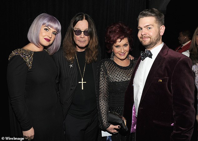Kelly, Ozzy, Sharon and Jack Osbourne pictured at the Grammy Awards in 2014