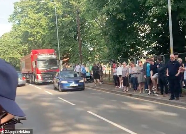 Protesters and counter-protesters could be seen on opposite sides of the road outside the hotel