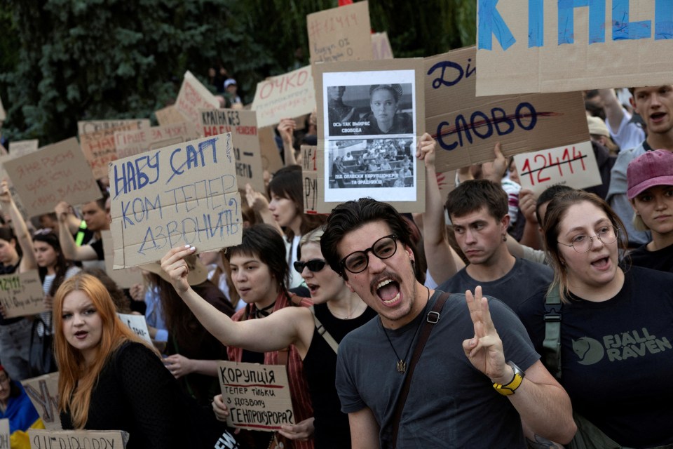 Ukrainians protesting a new law that limits the independence of anti-corruption institutions.