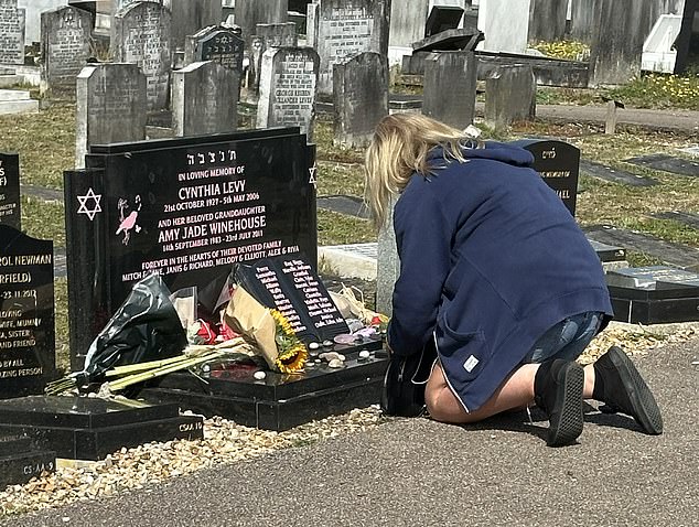 They were joined by friends, family, and fans at the graveside, where they left flowers and messages addressed to their daughter