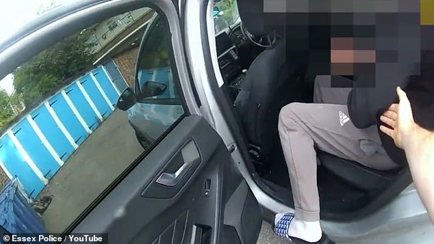 The bodycam video from Essex Police in Harlow shows the man being put into a car yesterday