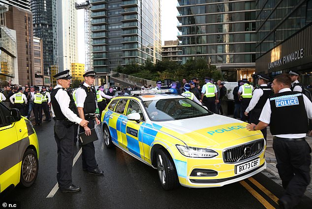 Protests outside the Britannia International Hotel in Canary Wharf in London on Tuesday