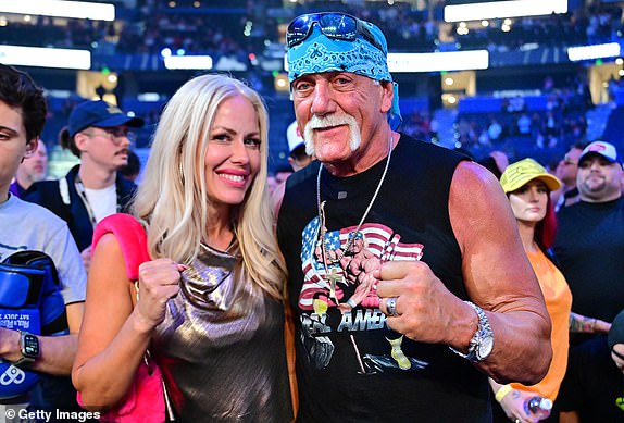 TAMPA, FLORIDA - JULY 20: Terry "Hulk Hogan" Bollea poses with wife Sky Daily during the Jake Paul vs Mike Perry main event at Amalie Arena on July 20, 2024 in Tampa, Florida. (Photo by Julio Aguilar/Getty Images)