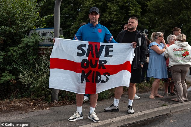 Watching Essex Police escorting Far Left troublemakers to a confrontation with local residents protesting against a hotel in Epping being converted into an asylum hostel for single men should surprise nobody, writes Richard Littlejohn