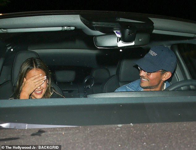 The pair shared a smile as they made their exit
