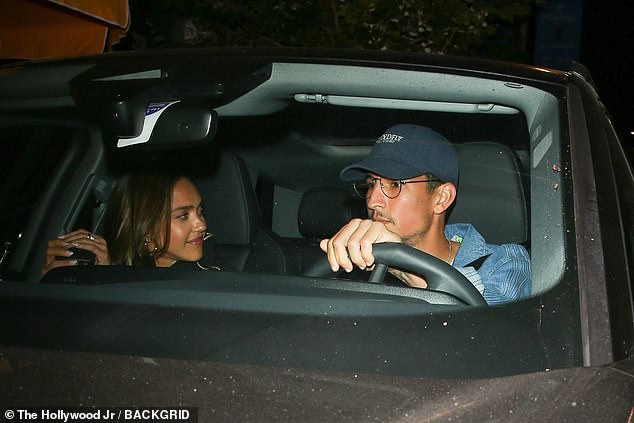 The actress is in the midst of a divorce from estranged husband Cash Warren