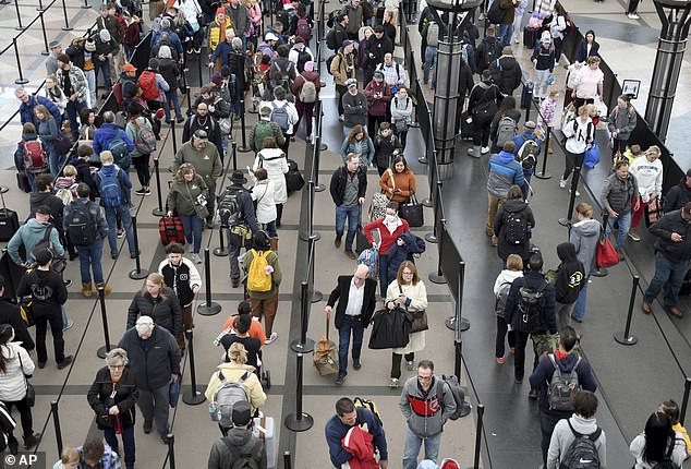 Passengers who are already in the air have been warned to 'expect some airborne holding due to excessive demand'